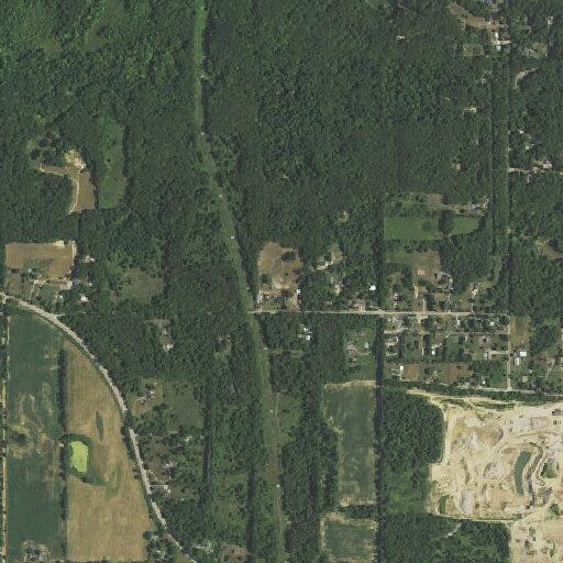 Tire and grass fire reported in wooded area