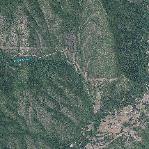 Men shooting airsoft guns near creek in open field