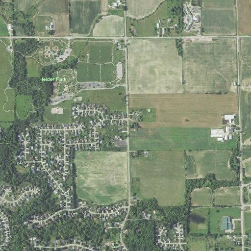 Power lines and pole down in yard in Holland Township