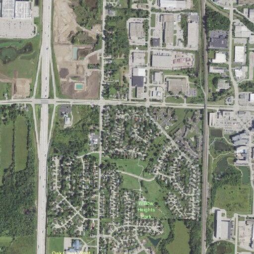 Person smoking on street near Willow Heights Park