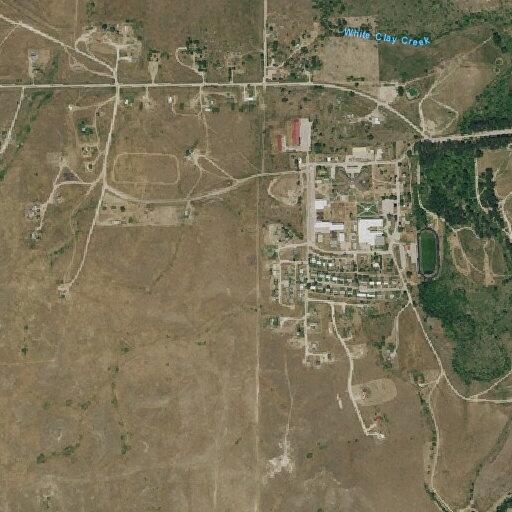 Male vomiting blood behind school campus in Pine Ridge