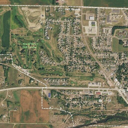 Buckled westbound lanes on Highway 115 in Dell Rapids