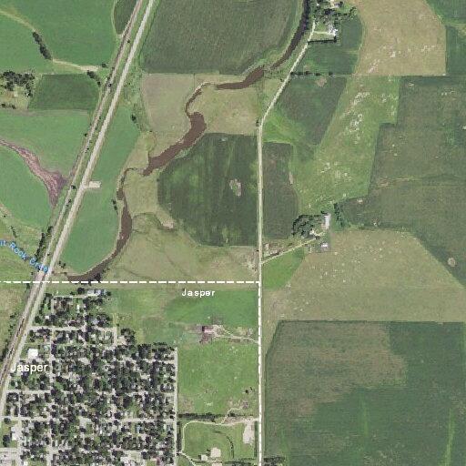 Child driving three wheeler without helmet in Jasper