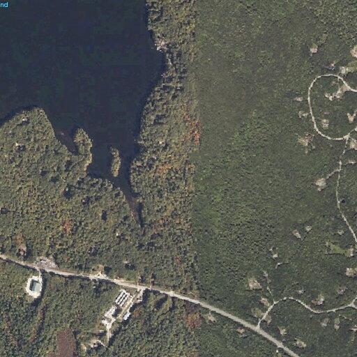Debris blocking roadway on Route 302 in Raymond