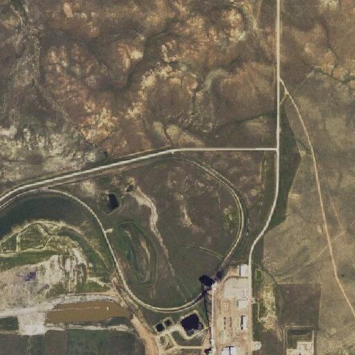 Wildfire burning near Coal Creek oil well area