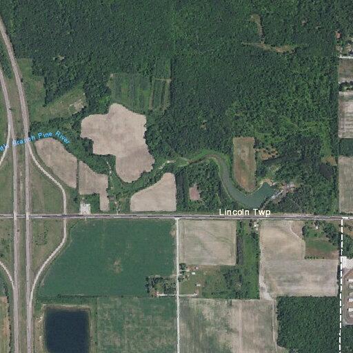 Man lying partly in ditch on M-61 near Melita Rd