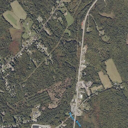 Outdoor fire near businesses on US Route 2 in Wilton