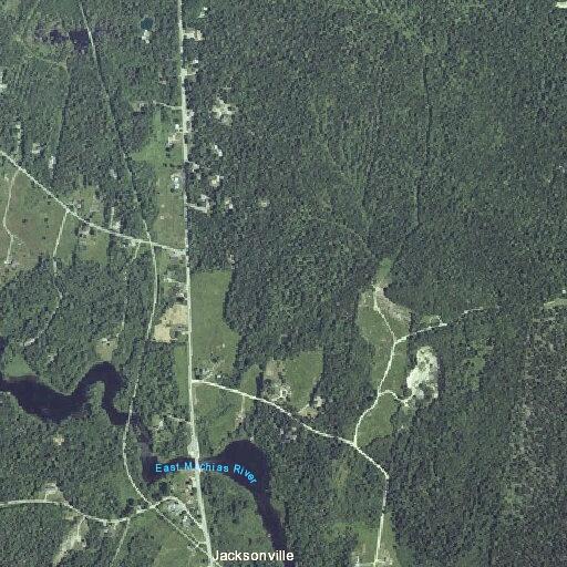 Smoldering equipment fire at gravel pit in East Machias