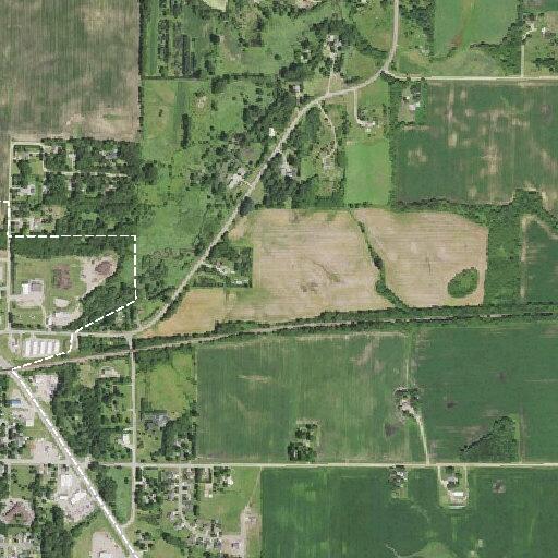 Grass fire spreading in roadside ditch