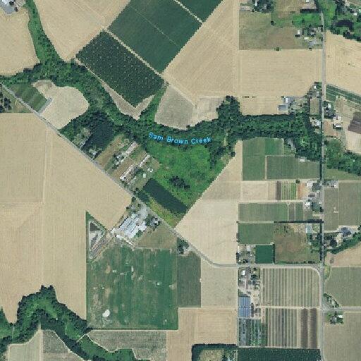 Out-of-control field fire near Gervais farm property