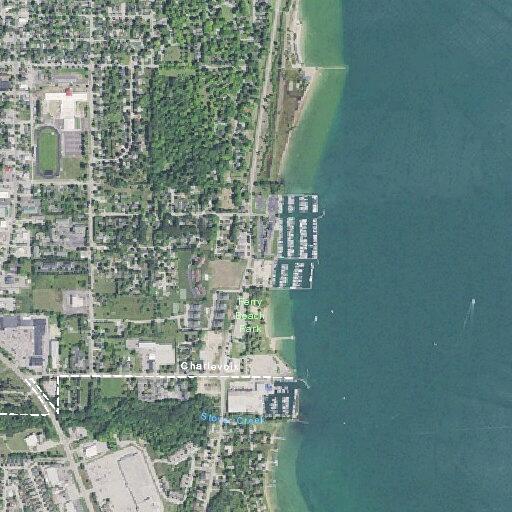 Jet skis spraying people near Ferry Beach pier