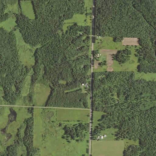 Barn fire spreading toward nearby woods and house