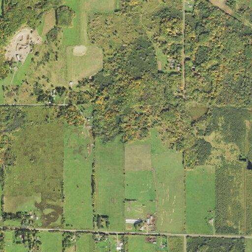 Lawnmower fire in field on County Road 4