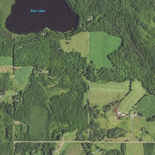 Fire reported behind house on County Road 144