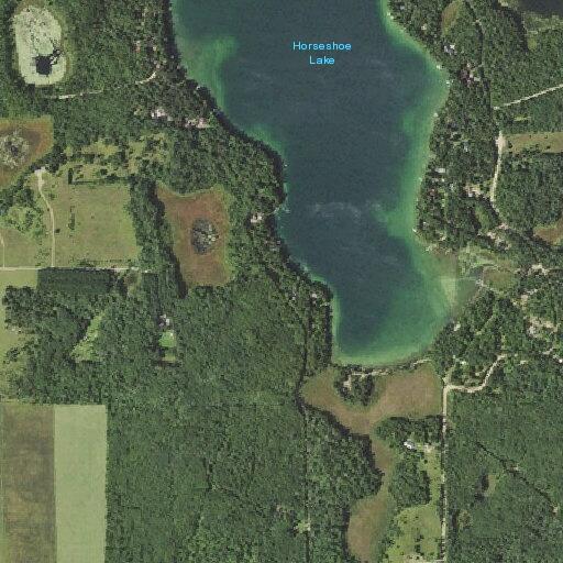 Brush piles burning on private property