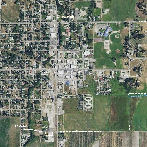 Smoke reported in field near Chewelah apartments