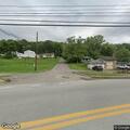 Truck blocks road while trailer is loaded