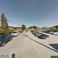 Person with headache and difficulty breathing at community hall