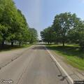 Deer carcass and car bumper blocking State Route 36