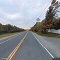 Officer checks silver sedan after road hazard call