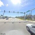 Person experiencing breathing problems at bus stop in Largo