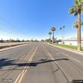 Person on scooter in traffic lane near I-17