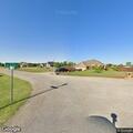 Person exhibiting abnormal behavior at Mustang residence