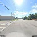 Two men fighting on sidewalk near NW 135th Street