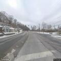 Disabled SUV partially blocking roadway