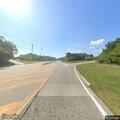 Injured deer blocking curve on Montauk Highway
