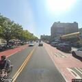 Person lying outstretched on subway platform at East 149th St