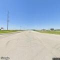 Traffic stop involving minivan at highway intersection