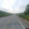 Tree blocking Route 11 after crash with truck
