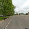 Traffic stop involving small motorcycle on Main Street