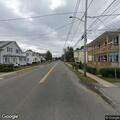 Person knocking on back door at County Street home