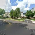 Person suffering from back pain in Quakertown apartment