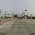 Female driver slouched over in vehicle on Carson Street