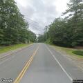 Tree blocking edge of road near US Route 3