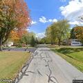 Person suffering from severe back pain at Hickory Overlook