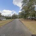 Cars blocking sidewalk on Woody Road