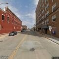 Police contact group on parking ramp rooftop