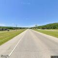 Pedestrian walking in roadway on Highway 21