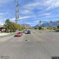 Car driving without lights on Highland Drive