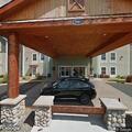 Person with chest pain at Woodburn hotel room