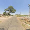 Officer checks barefoot woman walking on Road 25