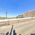 Stranded car with flat tire at 16 off-ramp