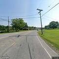 Downed utility poles block road near Penn Run