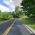 Tree on power lines over vehicle on Cummington Road