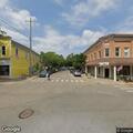 Woman unconscious with abnormal breathing at street corner