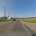 Officer directs traffic at highway intersection
